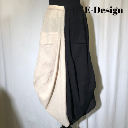2025 E-Design vandfalds nederdel crepet hr/bomuld 2-farvet sort/sand