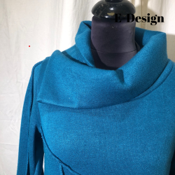 E-Design kjole med twistet krave og udvendige smme Petrol